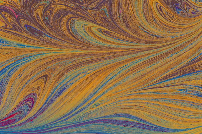 Dynamic abstract art featuring vibrant swirling patterns and colorful textures, evoking movement and creativity.